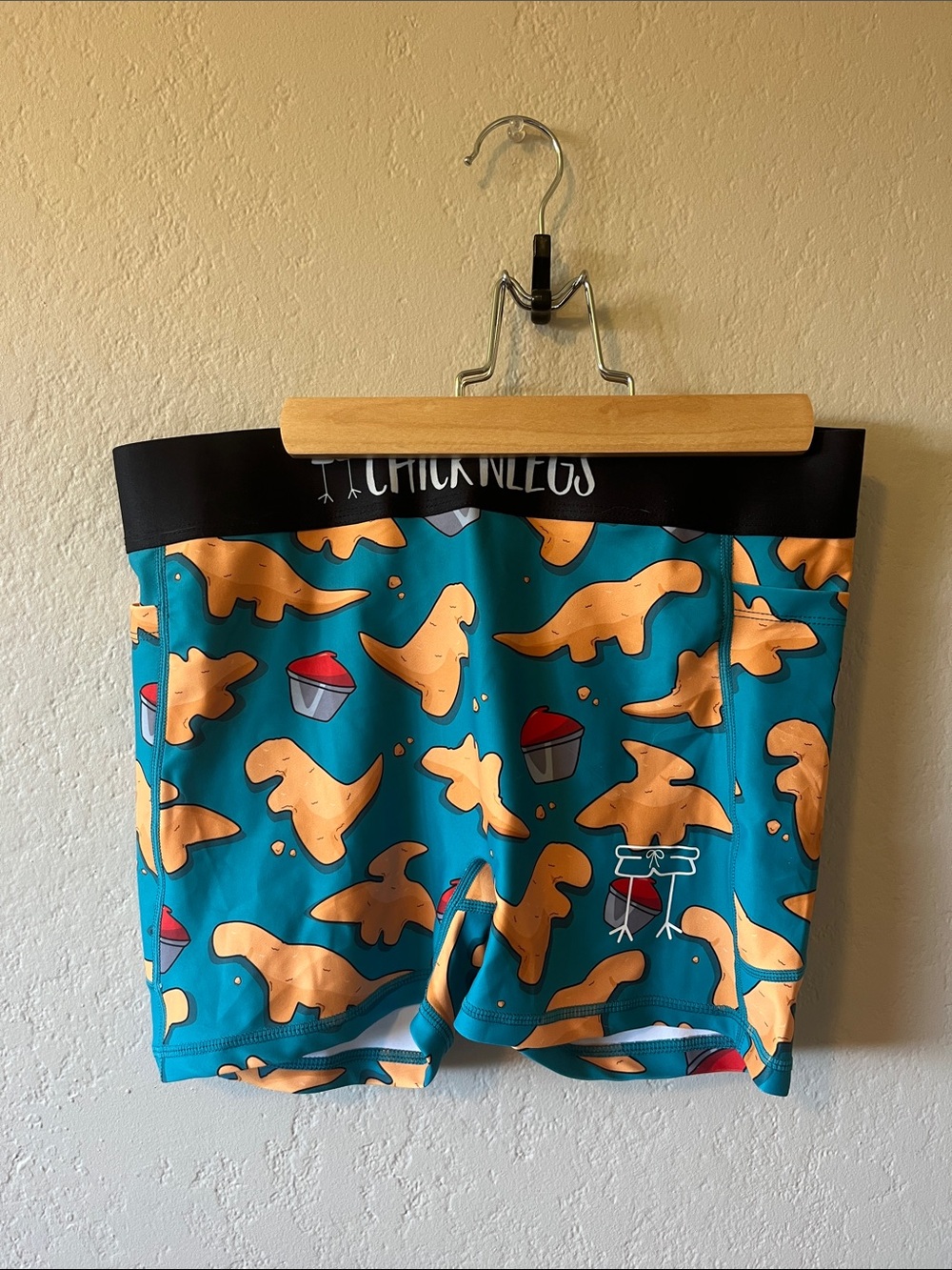 ChiknLegs Women’s Dino Nuggets compression shorts 3” - Teal & Orange